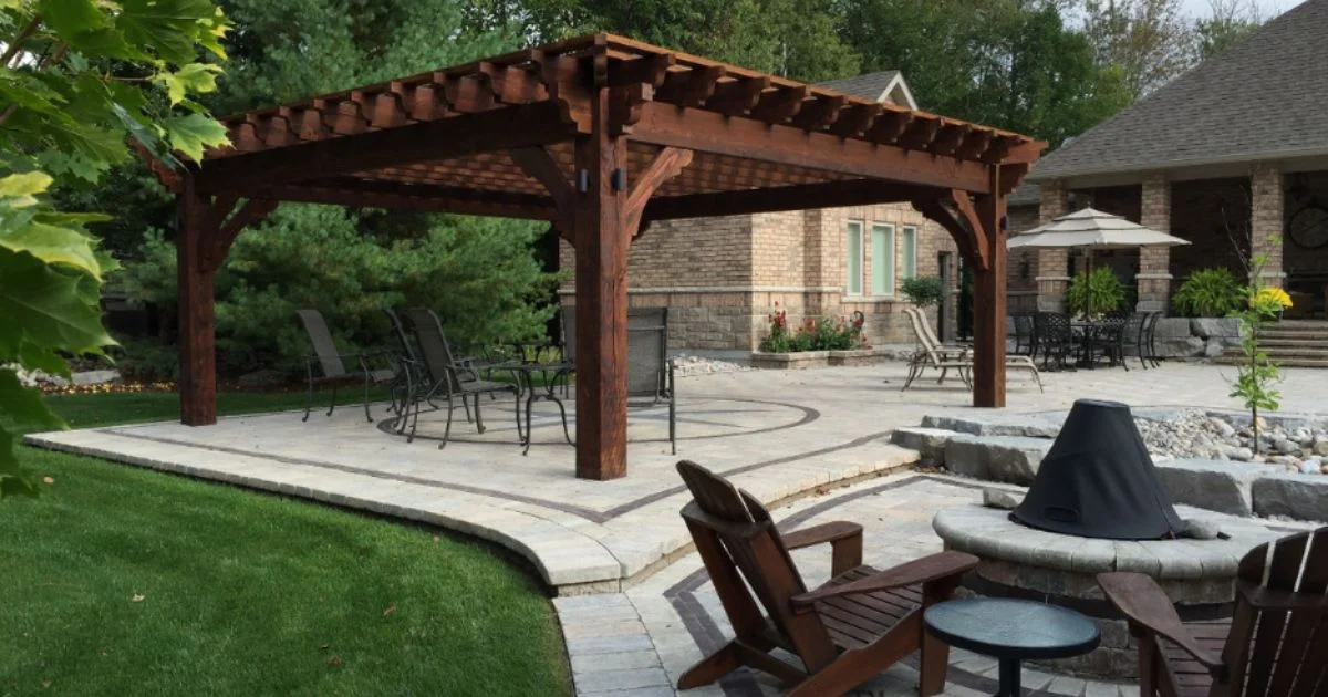 Custom timber pergola over backyard patio seating area